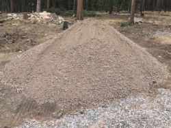 class 6 granite roadbase. It works great for driveways; for car, truck and trailer parking areas, as a base for and
    behind retaining walls.