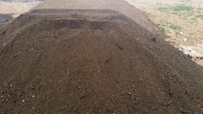 Screened Fill Dirt being processed