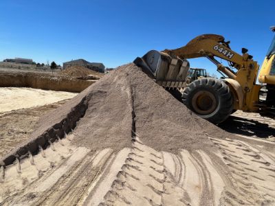 a photo of a pile of screened fill dirt.